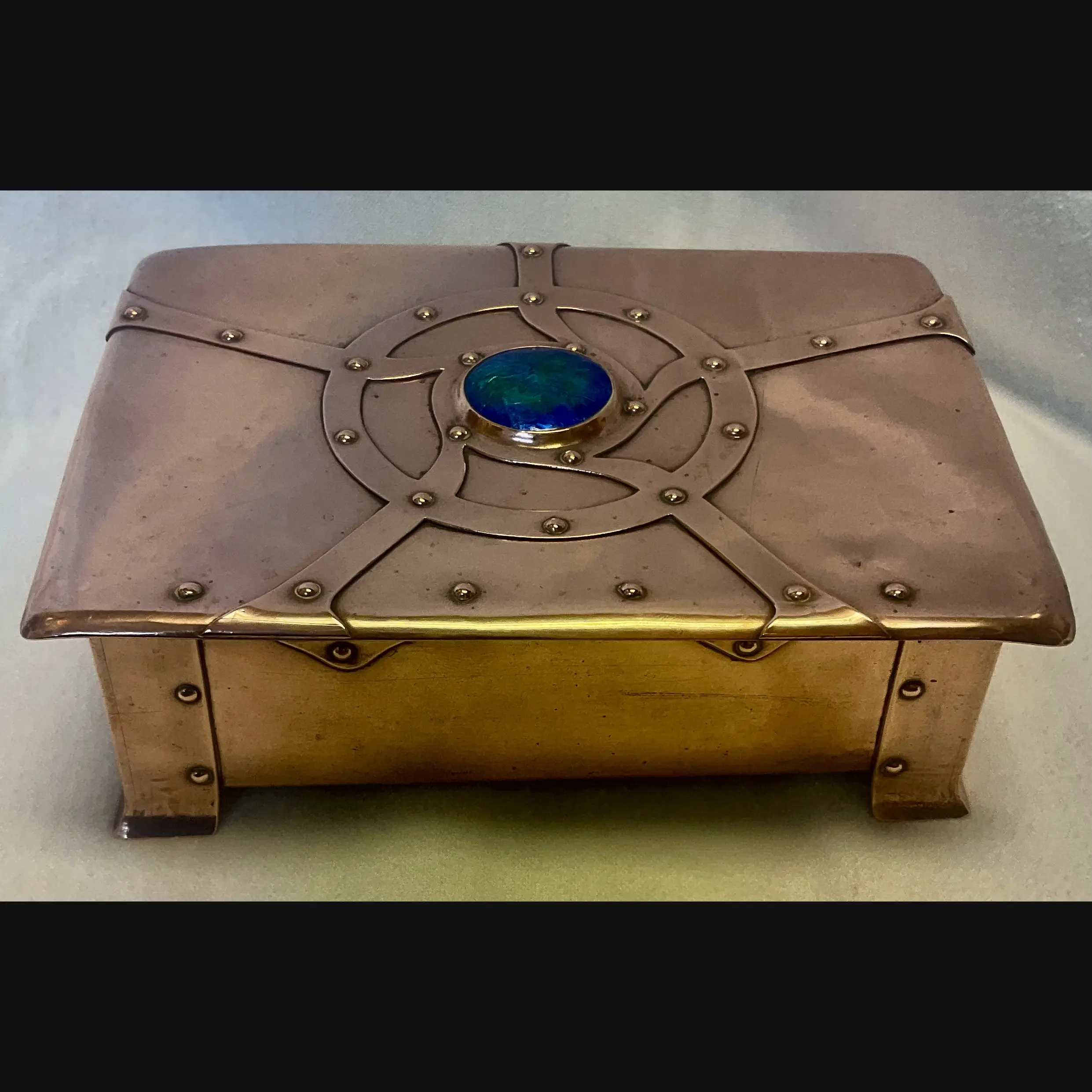 fw  a e jones arts and crafts copper and enamelled strap top box designed by annie stubbs
