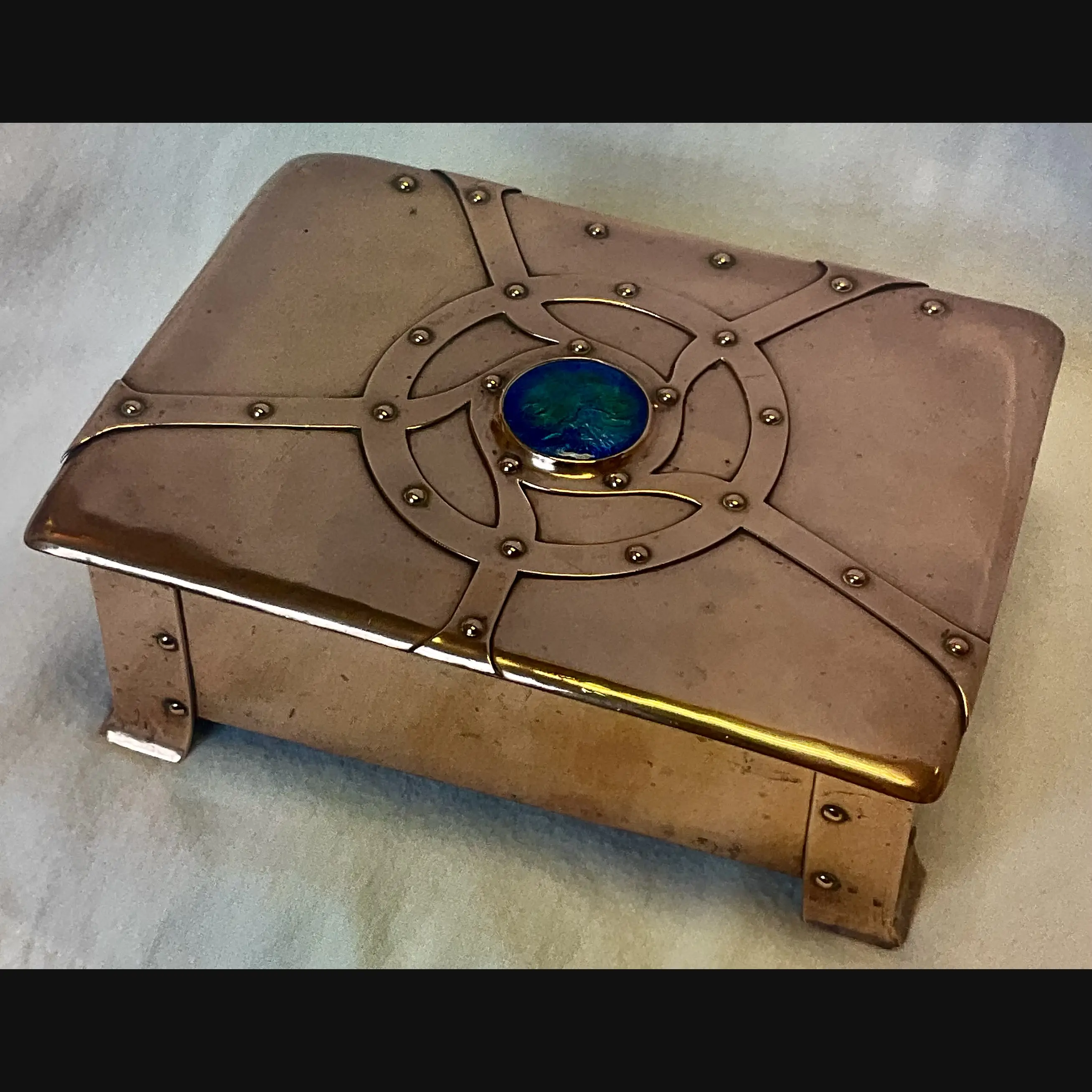 fw  a e jones arts and crafts copper and enamelled strap top box designed by annie stubbs