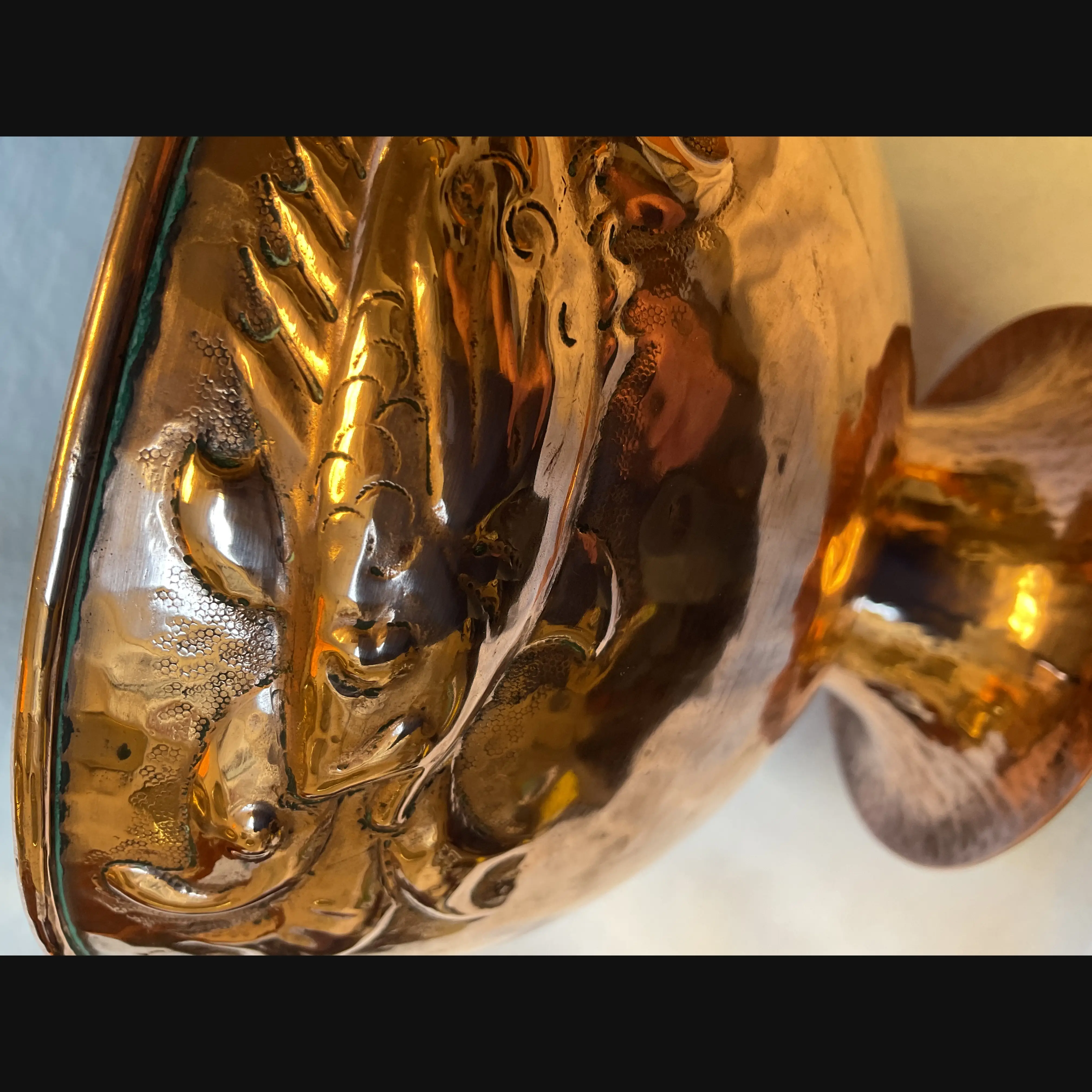 newlyn cornish arts and crafts copper footed bowl with repeating fish and seaweed design c1910
