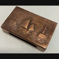 newlyn copper arts and crafts large copper matchbox cover with luggers and lighthouse c1910