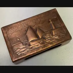 newlyn copper arts and crafts large copper matchbox cover with luggers and lighthouse c1910