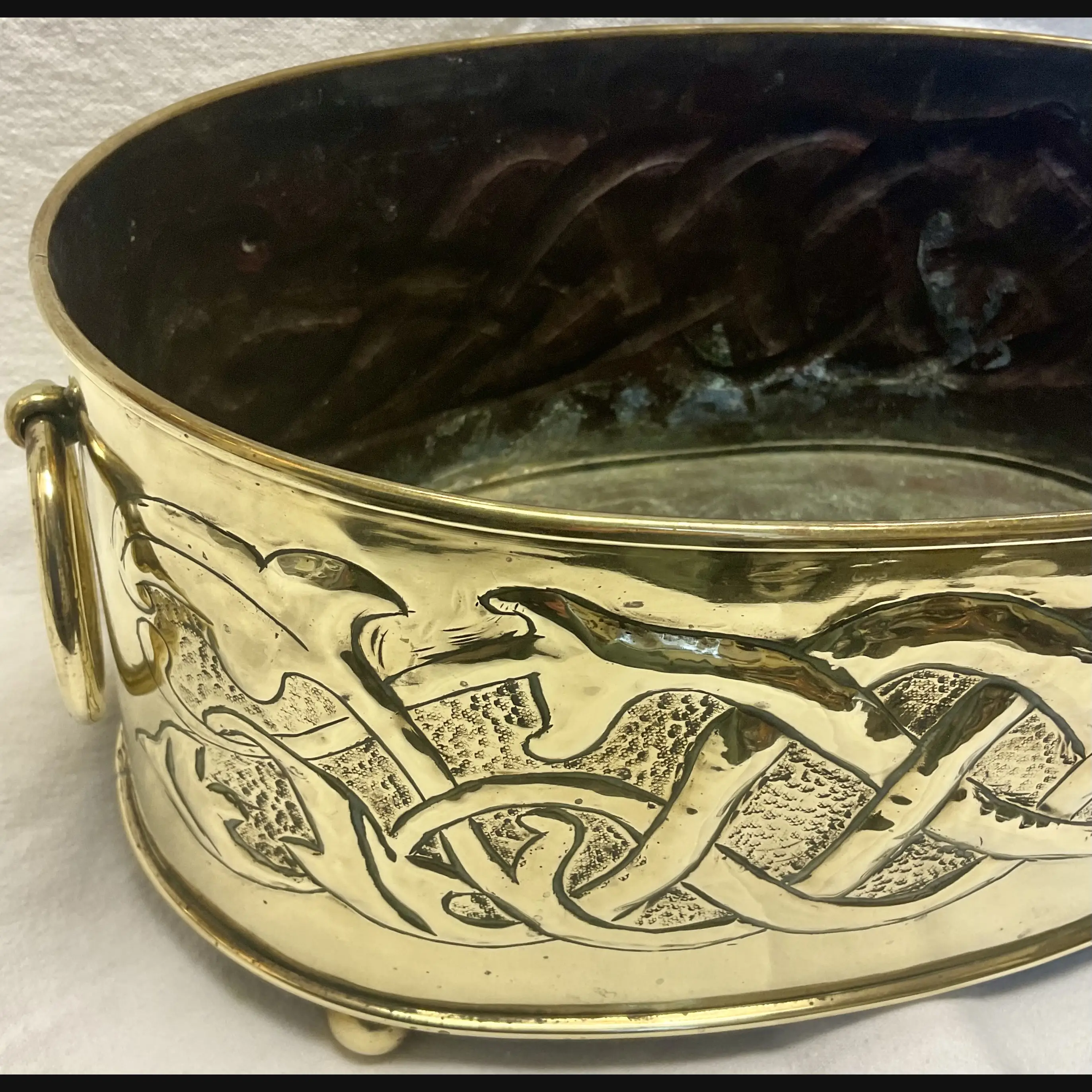 large scottish arts and crafts entwined celtic serpent brass planter with ring handles c1910
