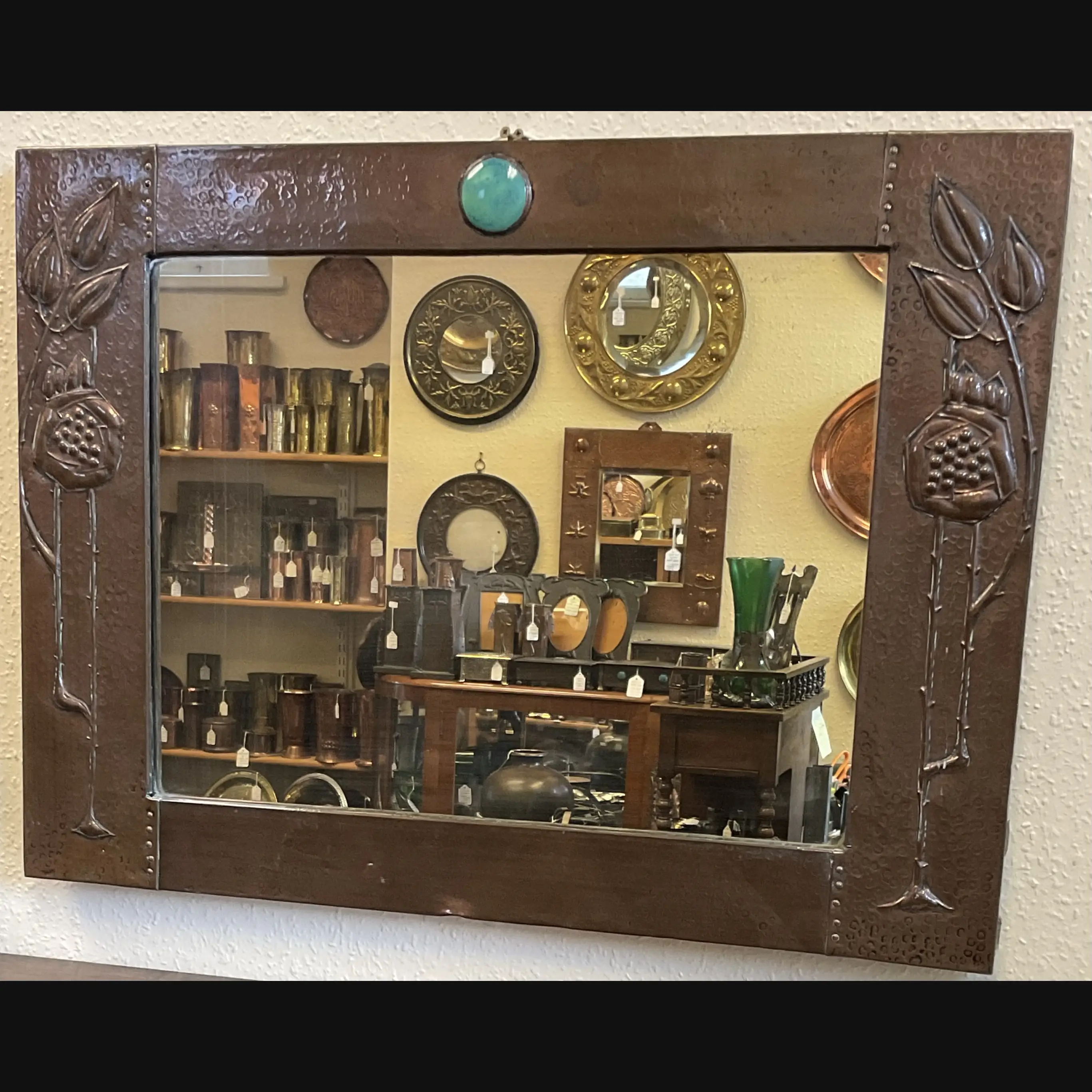 arts and crafts liberty and co copper seed head mirror with ruskin cab c1905