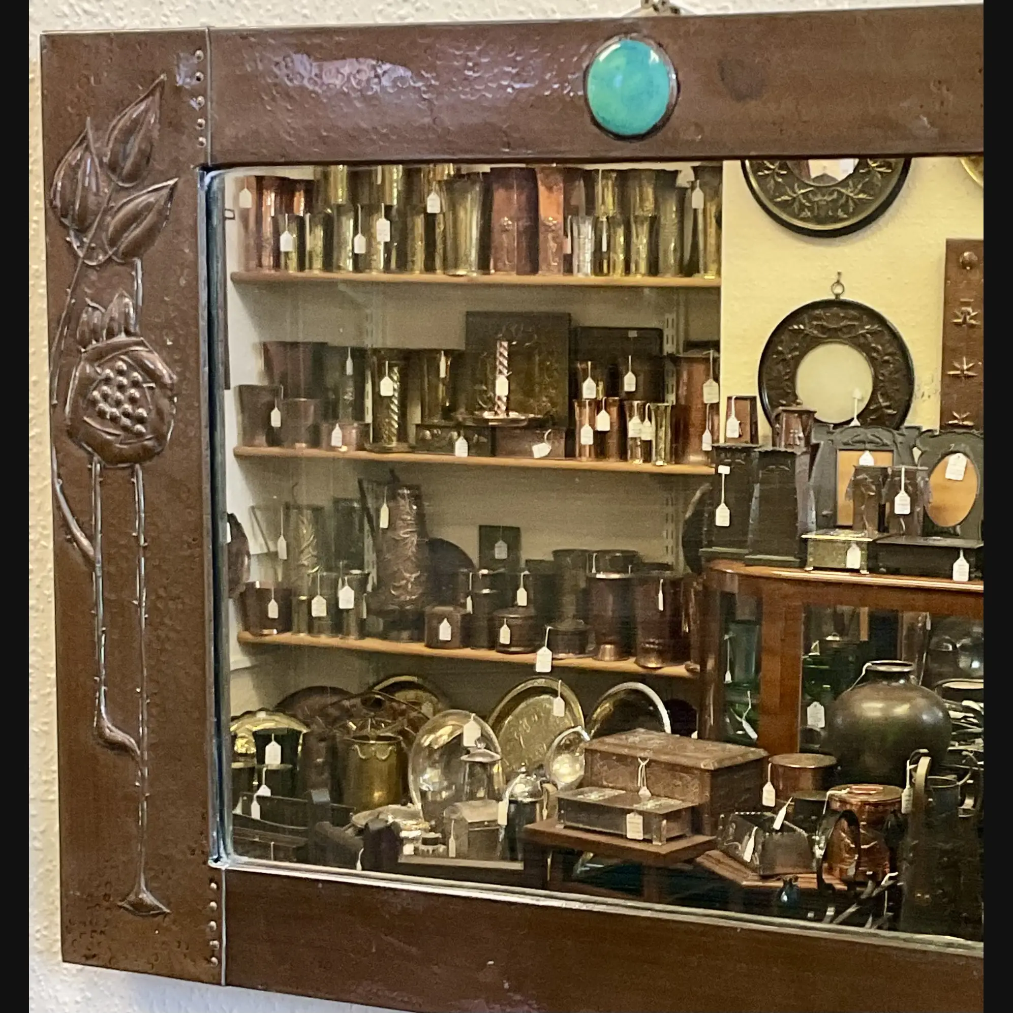 arts and crafts liberty and co copper seed head mirror with ruskin cab c1905