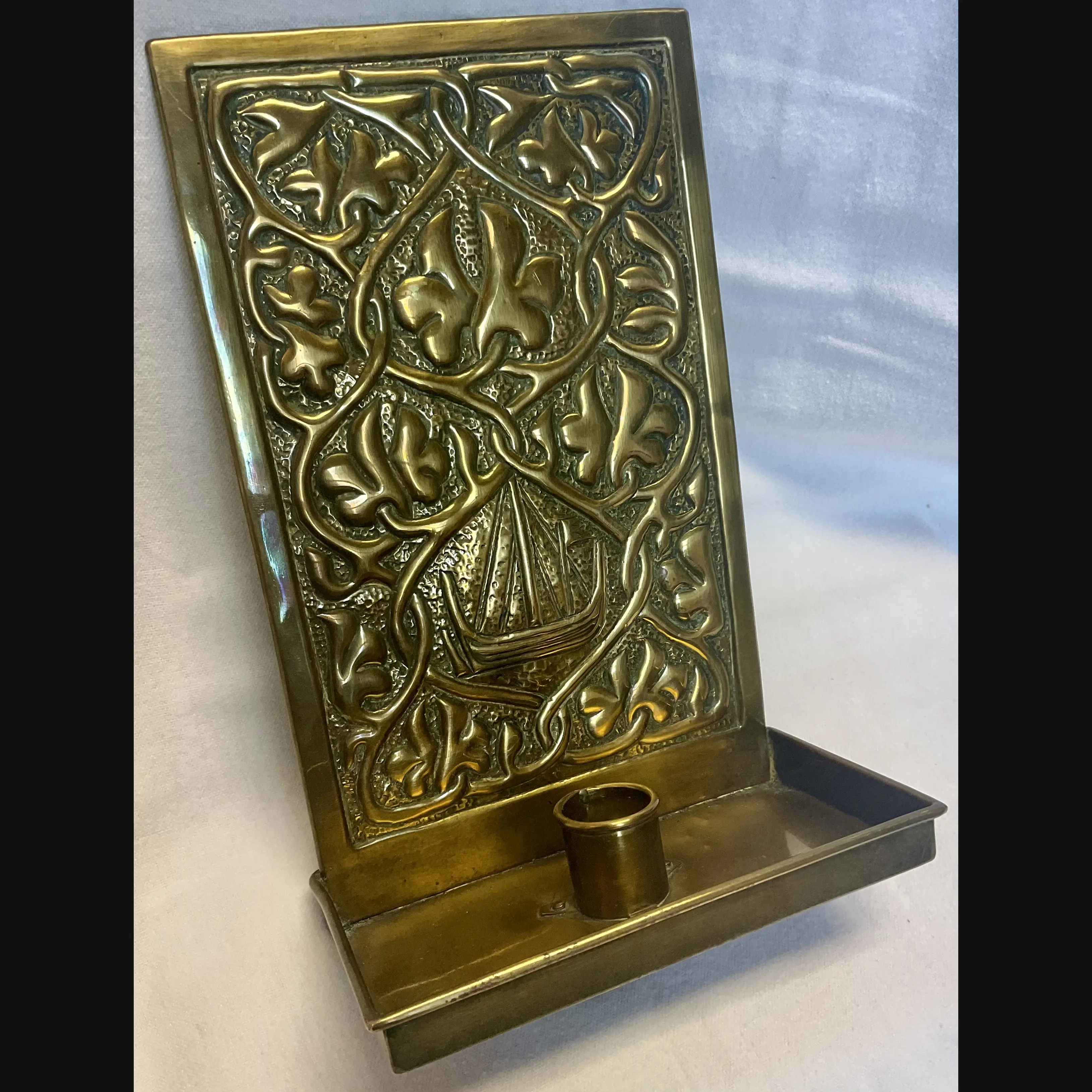 alexander ritchie iona celtic art scottish arts and crafts single wall sconce celtic entrelac and boat