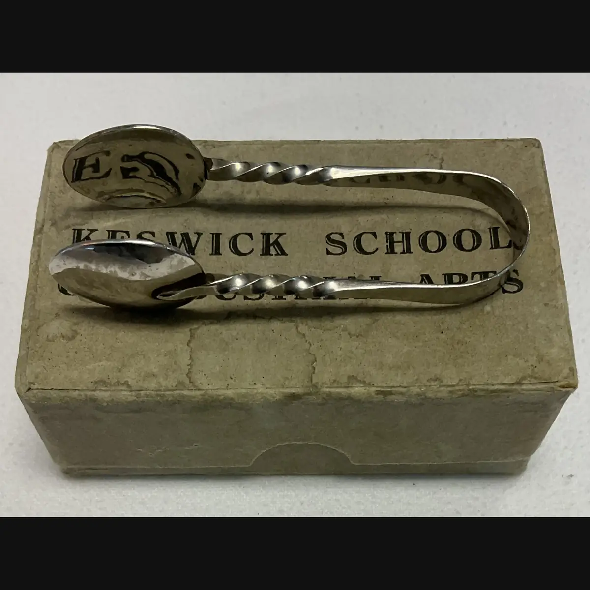keswick school of industrial art ksia arts and crafts early boxed pair of steel sugar tongs